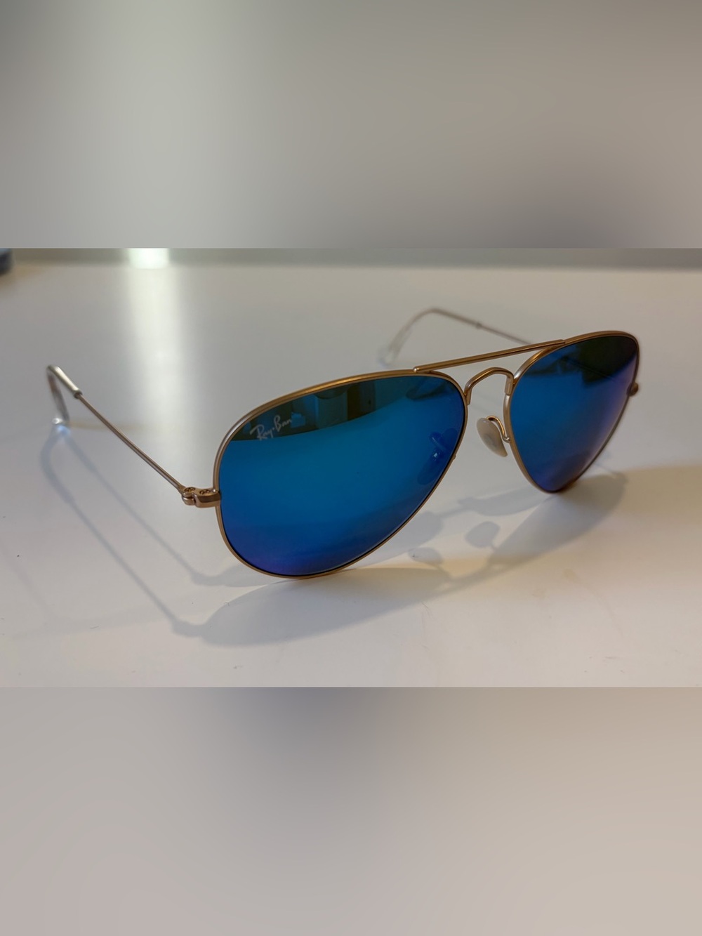 Ray-Ban Gold Frame Sunglasses with Blue Mirrored Lenses